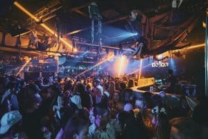 Nightclub in Toronto with lively dance floor and Halloween decorations, perfect for nightlife lovers.