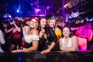 Vibrant Toronto nightclub with lively crowd and dance floor.