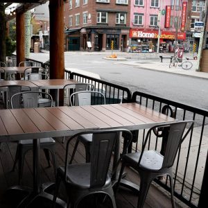 Outdoor patio at Toronto club during daytime.
